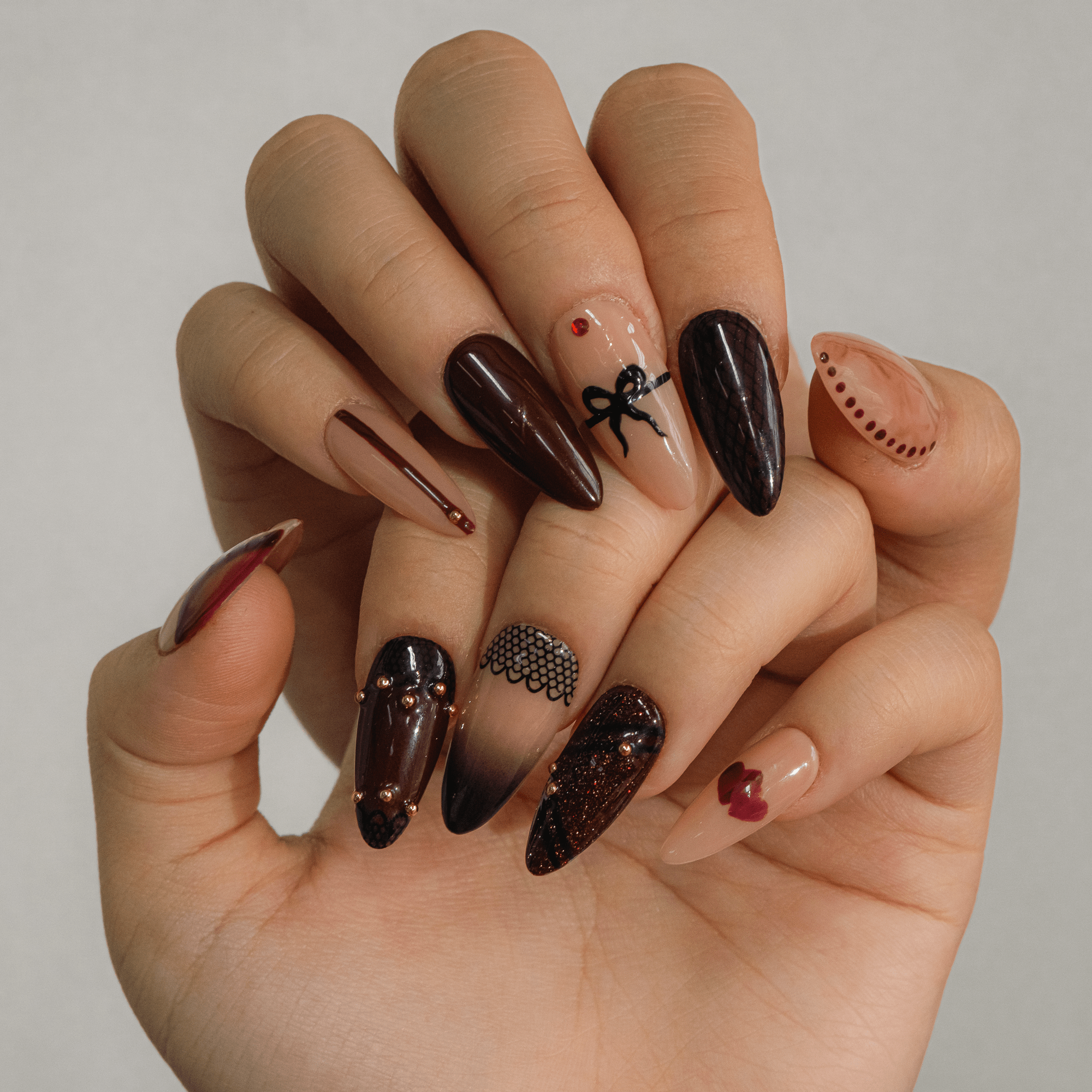 Ruby Lace press-on nails – hand-painted reusable gel set by Handora