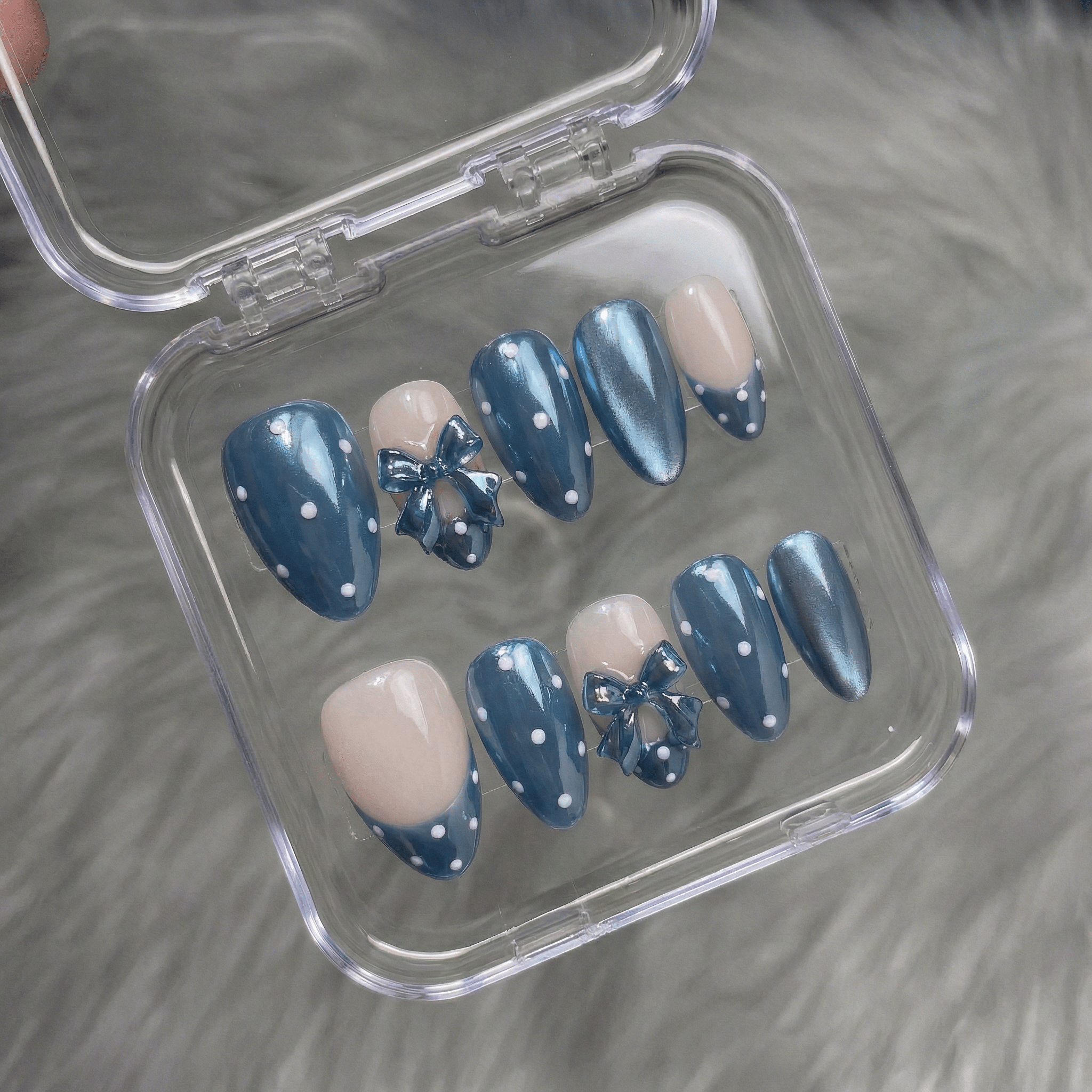 Ruby Polka press-on nails – hand-painted reusable gel set by Handora