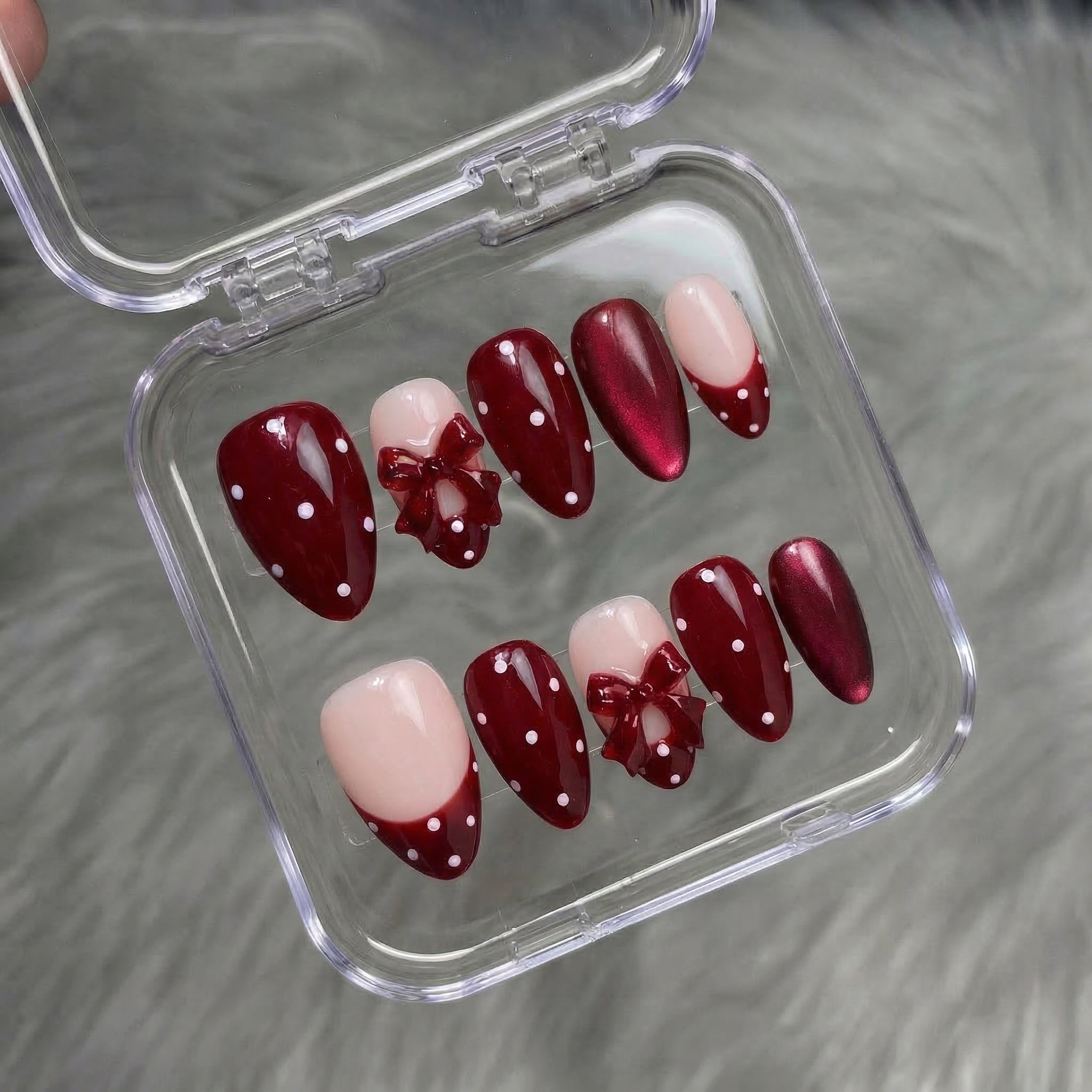 Ruby Polka press-on nails – hand-painted reusable gel set by Handora