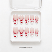 Ruby Romance almond press-on nails – design close-up by Handora