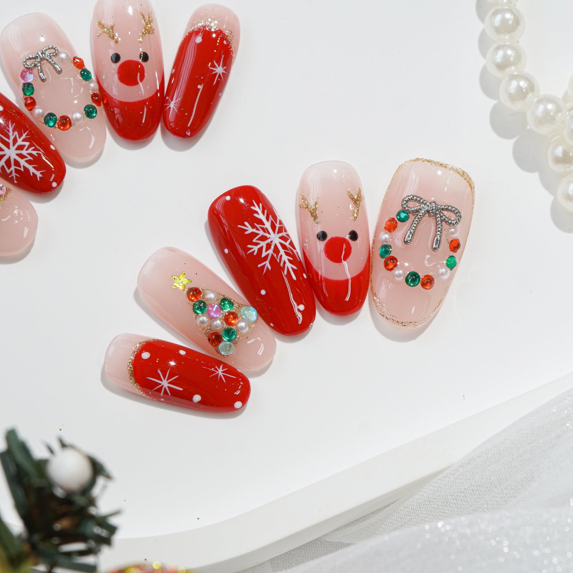 Rudolph’s Kiss salon-quality handmade press-on nails by Handora
