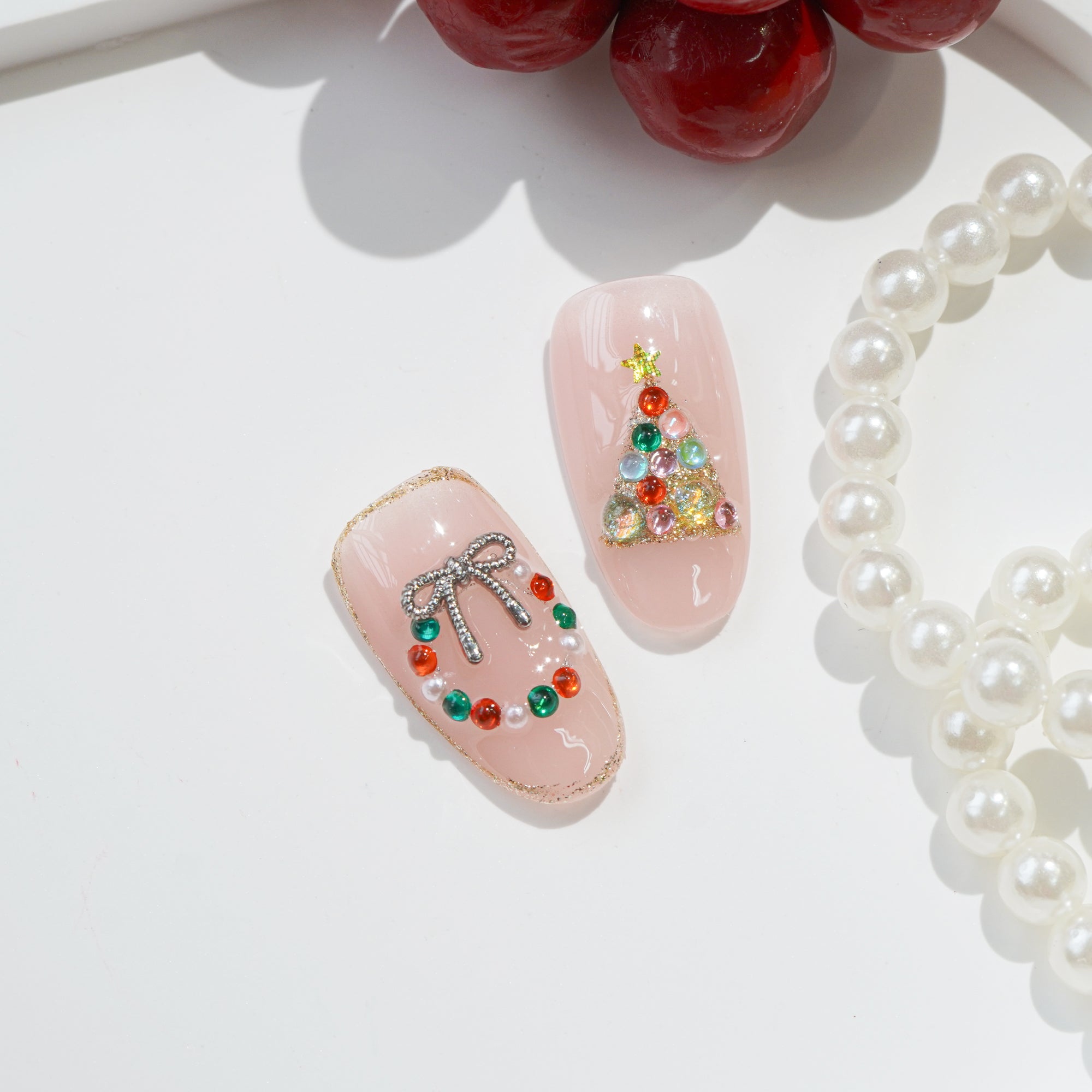 Rudolph’s Kiss cute nail design – handmade press-on nails by Handora
