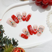 Rudolph’s Kiss almond cute press-on nails by Handora
