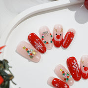 Rudolph’s Kiss press-on nails by Handora