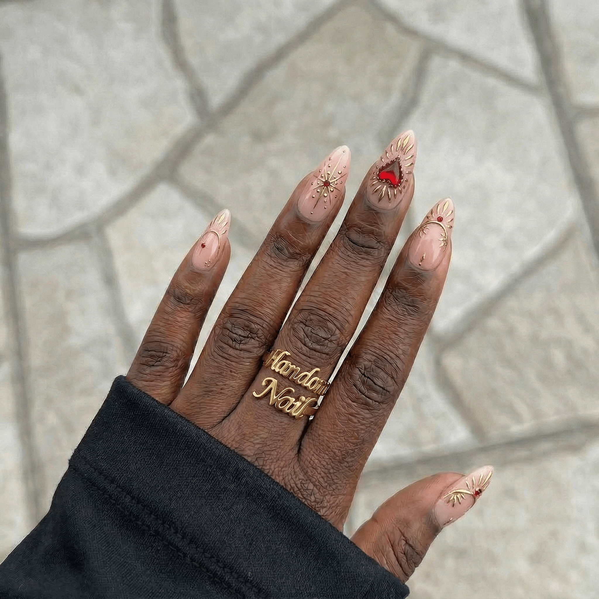 Sacred Ruby press-on nails – design close-up by Handora