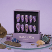 Sagi Wander press-on nails – hand-painted reusable gel set by Handora