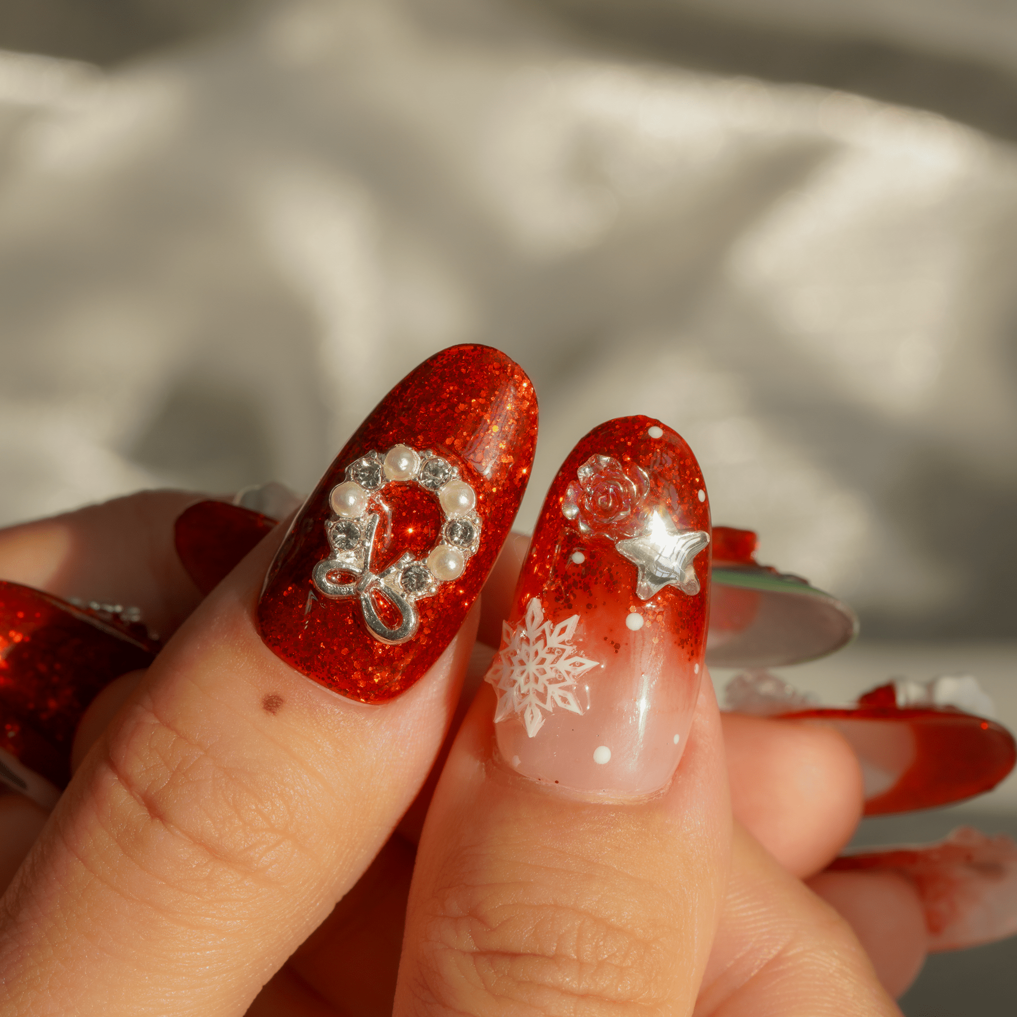 Santa Chic almond press-on nails – design close-up by Handora
