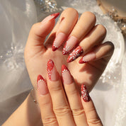 Scarlet Snow press-on nails – hand-painted reusable gel set by Handora
