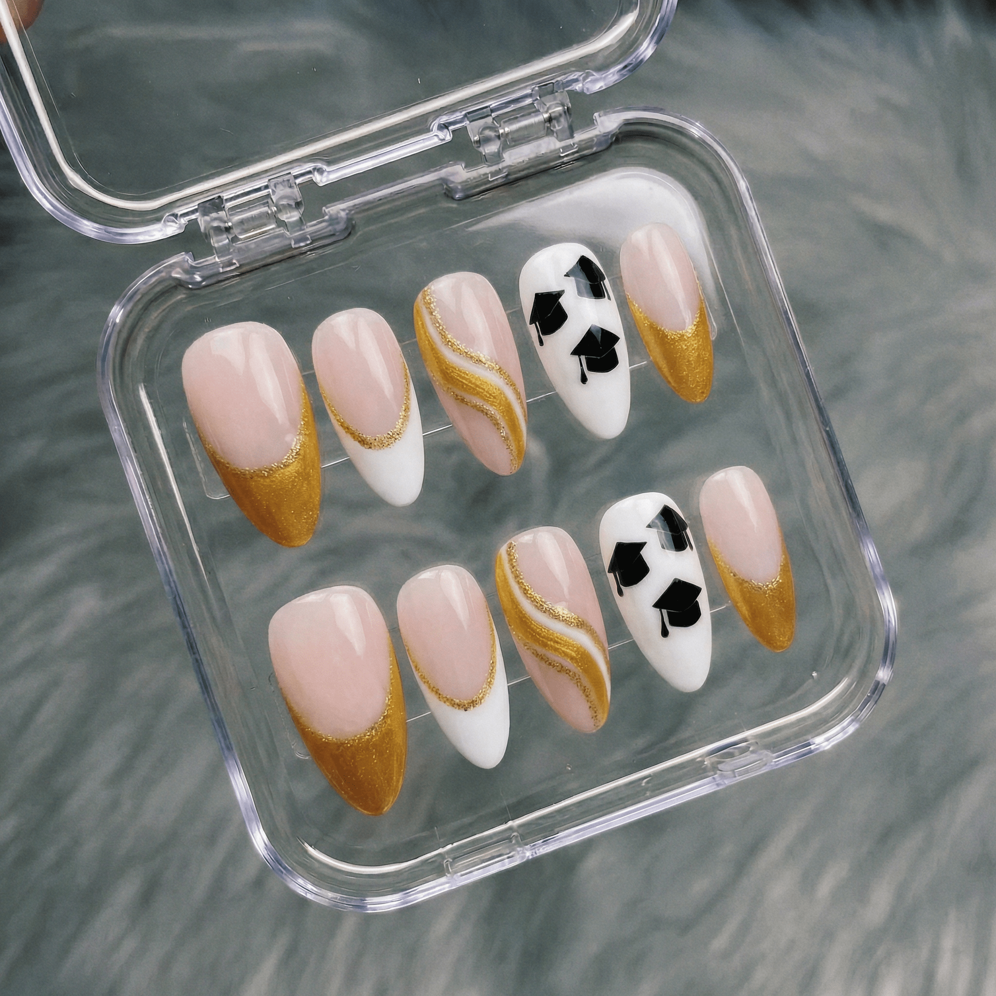 Scholar Spirit press-on nails worn on hand – almond shape by Handora
