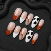Scholar Spirit press-on nails worn on hand – almond shape by Handora