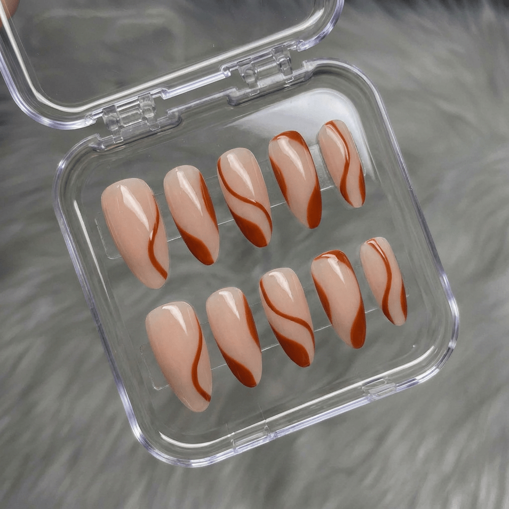 Serene Curve press-on nails worn on hand – almond shape by Handora