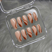 Serene Curve press-on nails worn on hand – almond shape by Handora