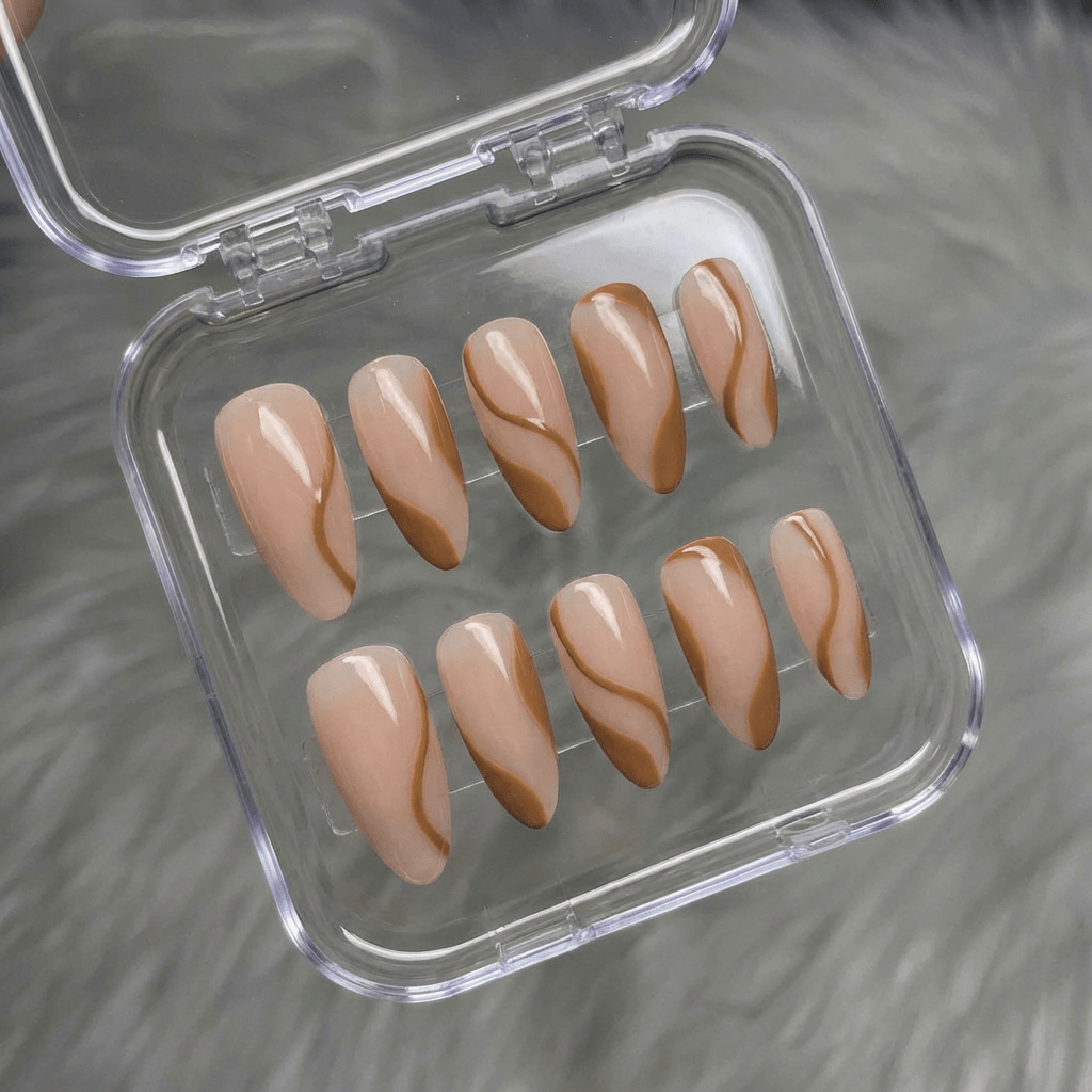Serene Curve press-on nails worn on hand – almond shape by Handora