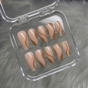 Serene Curve press-on nails worn on hand – almond shape by Handora