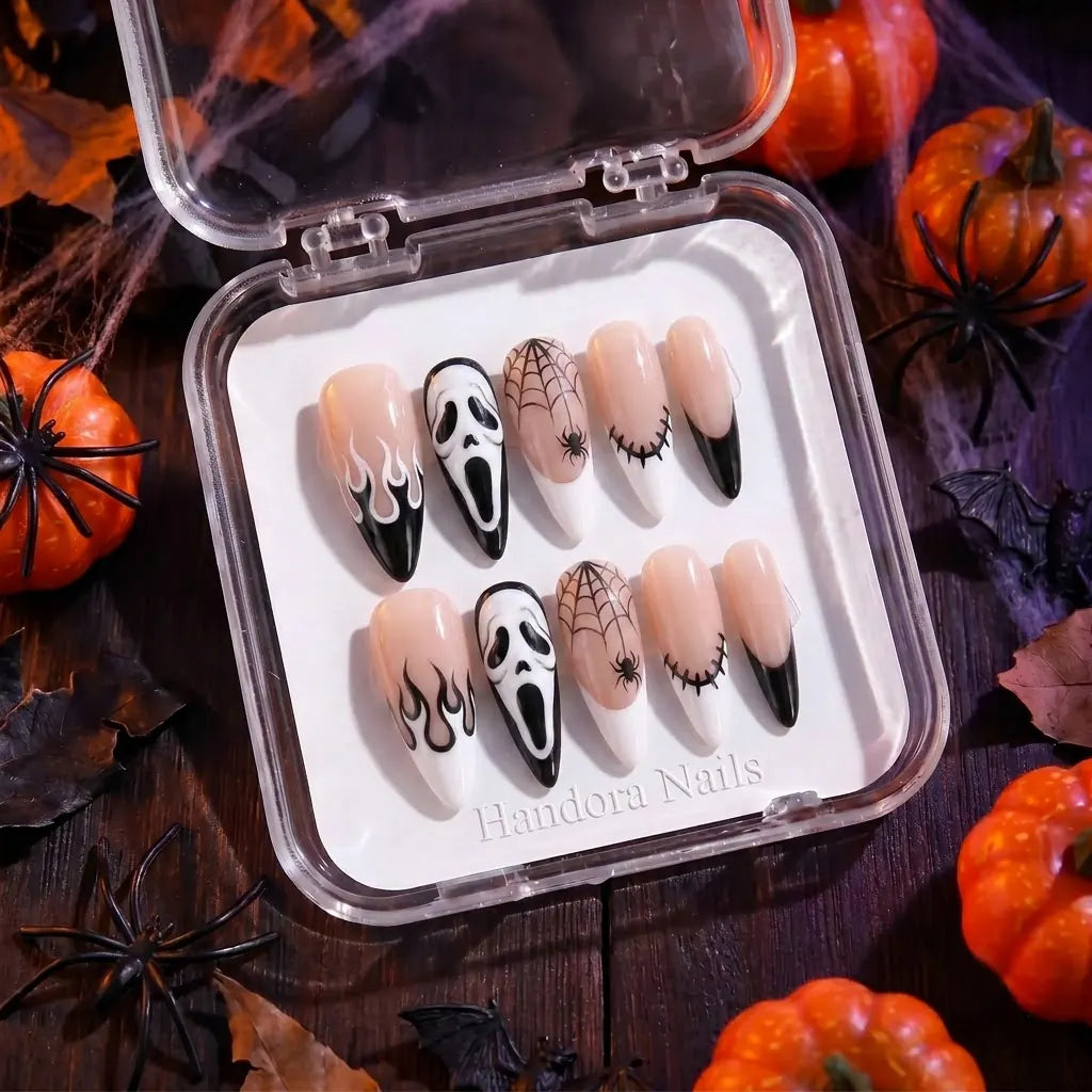 silent-shriek-a-pale-mask-spider-web-flames-and-stitches-in-black-and-white-on-long-stiletto-press-ons-handmade-for-the-handora-halloween-2026-collection-5.webp