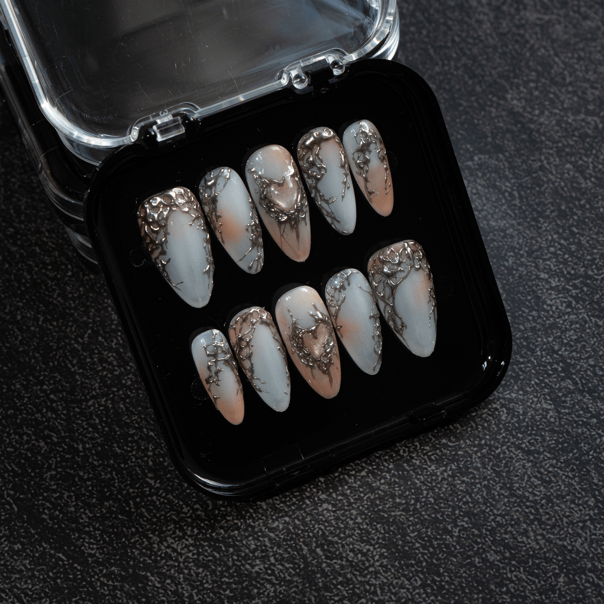 Silver Aura silver press-on nails by Handora