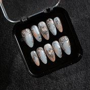 Silver Aura press-on nails – hand-painted reusable gel set by Handora