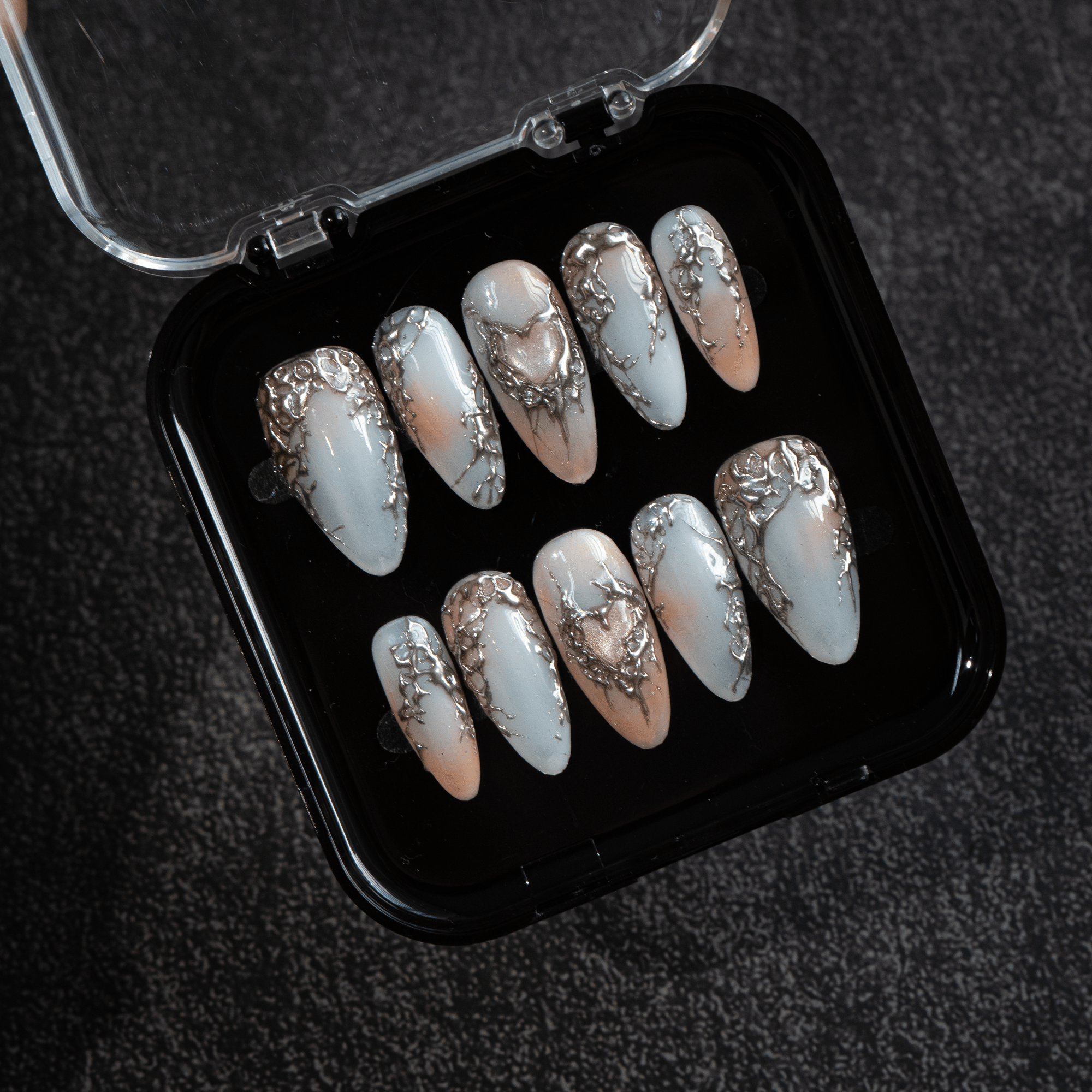 Silver Aura press-on nails – hand-painted reusable gel set by Handora