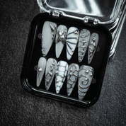 Silver Nebula stiletto press-on nails – design close-up by Handora