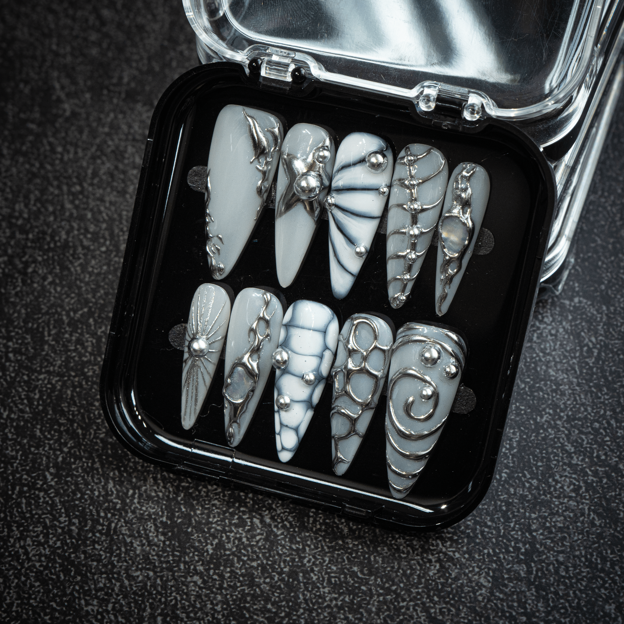 Silver Nebula stiletto press-on nails – design close-up by Handora