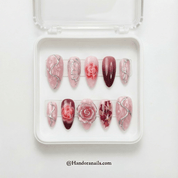 Silver Petals almond press-on nails – design close-up by Handora