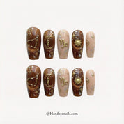 Solar Capricorn press-on nails – design close-up by Handora