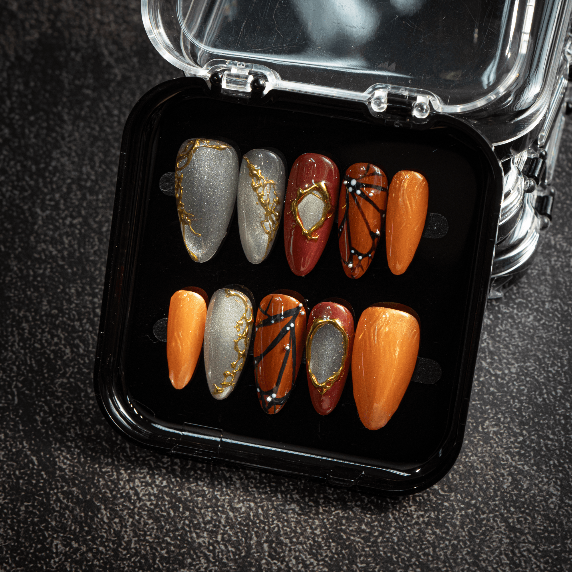 Solar Monarch press-on nails – hand-painted reusable gel set by Handora