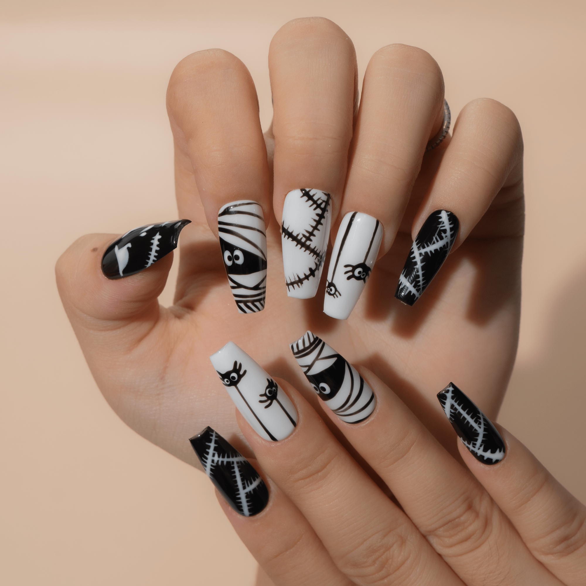 Spooky Chic press-on nails – hand-painted reusable gel set by Handora