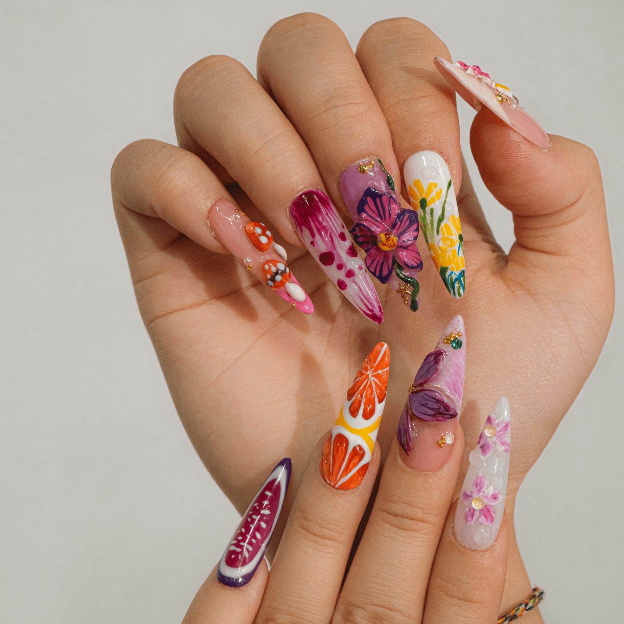 Spring Garden press-on nails – hand-painted reusable gel set by Handora