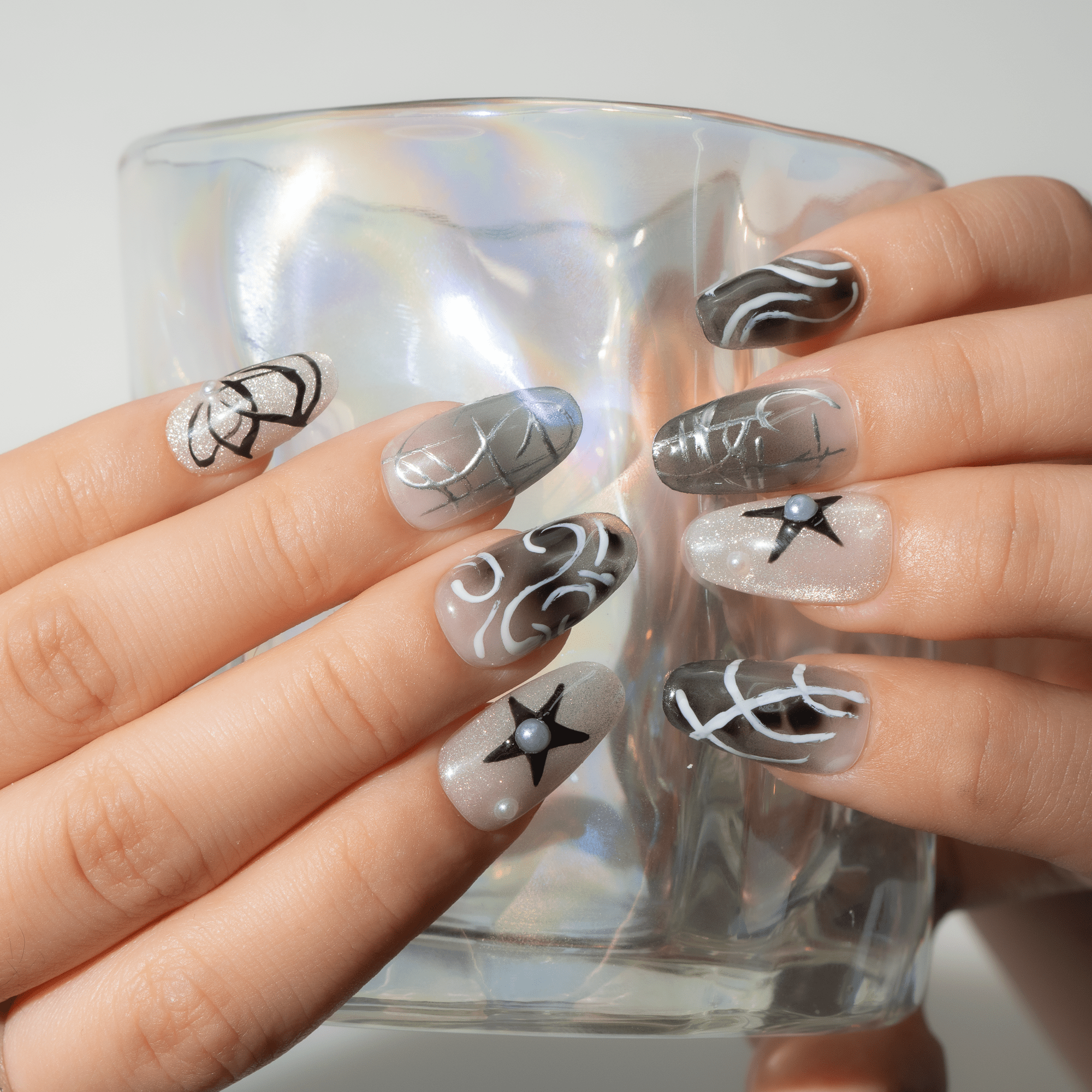 Star Dust press-on nails – hand-painted reusable gel set by Handora