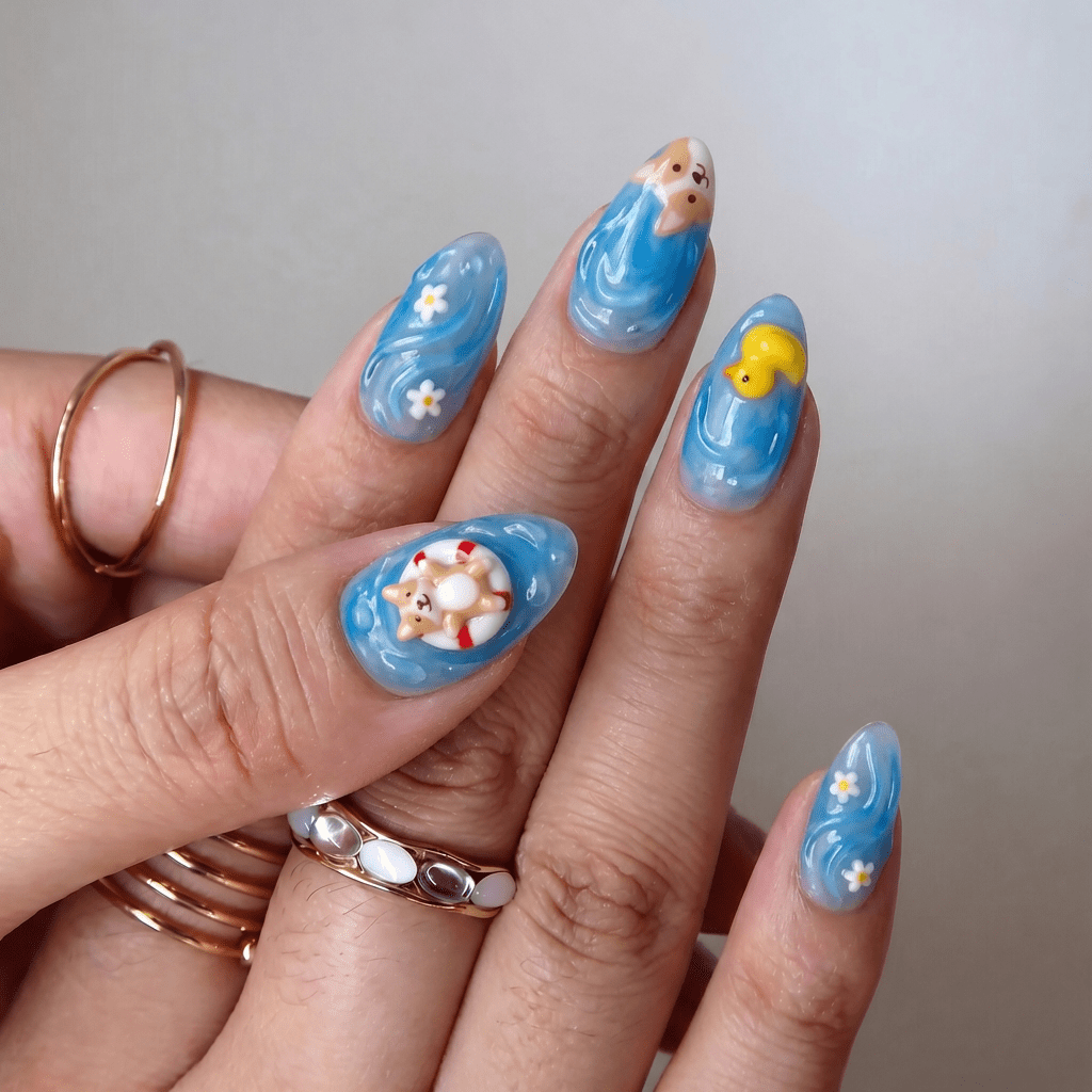 Summer Puppy press-on nails worn on hand – almond shape by Handora