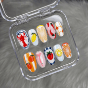 Summer Seafood almond press-on nails – design close-up by Handora
