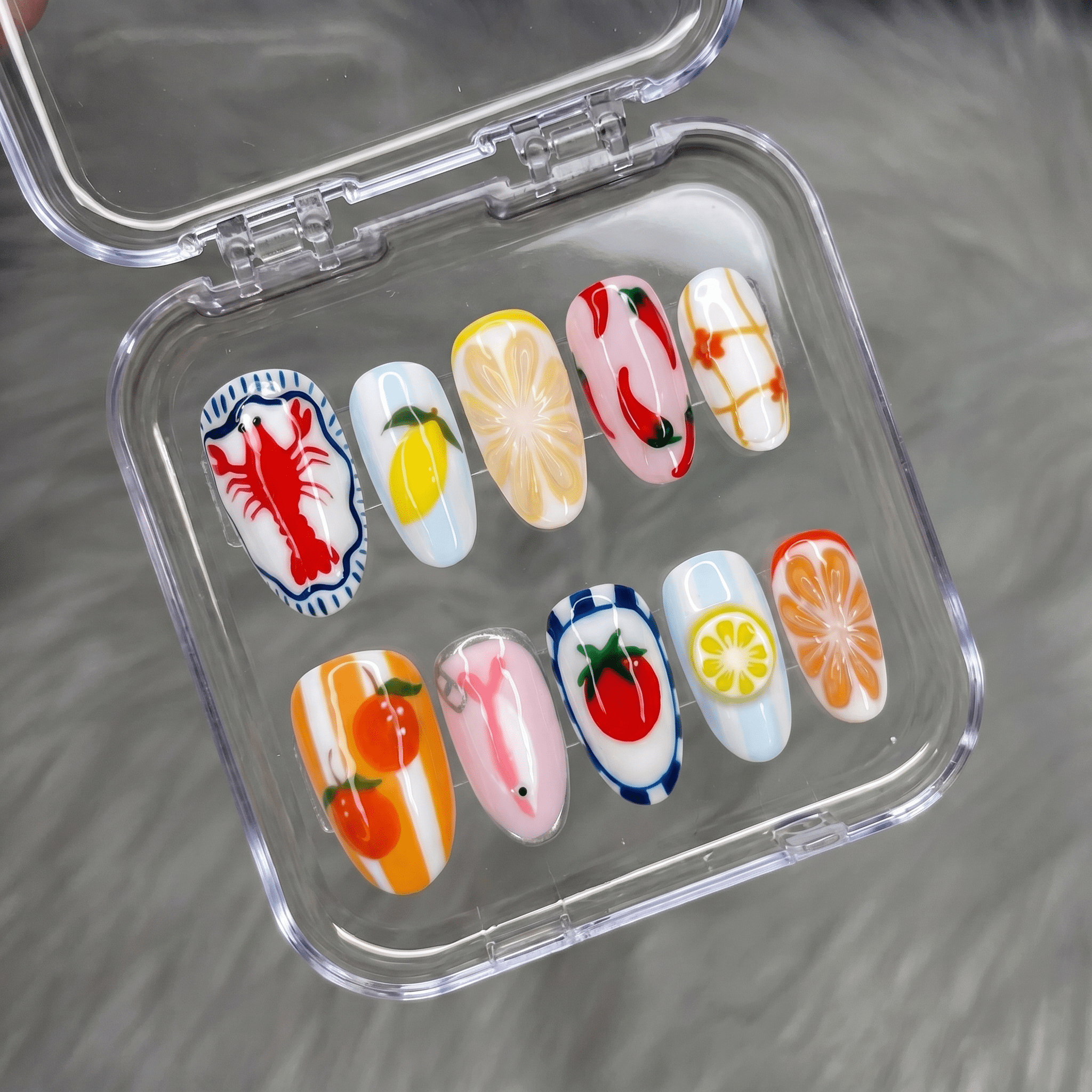 Summer Seafood almond press-on nails – design close-up by Handora