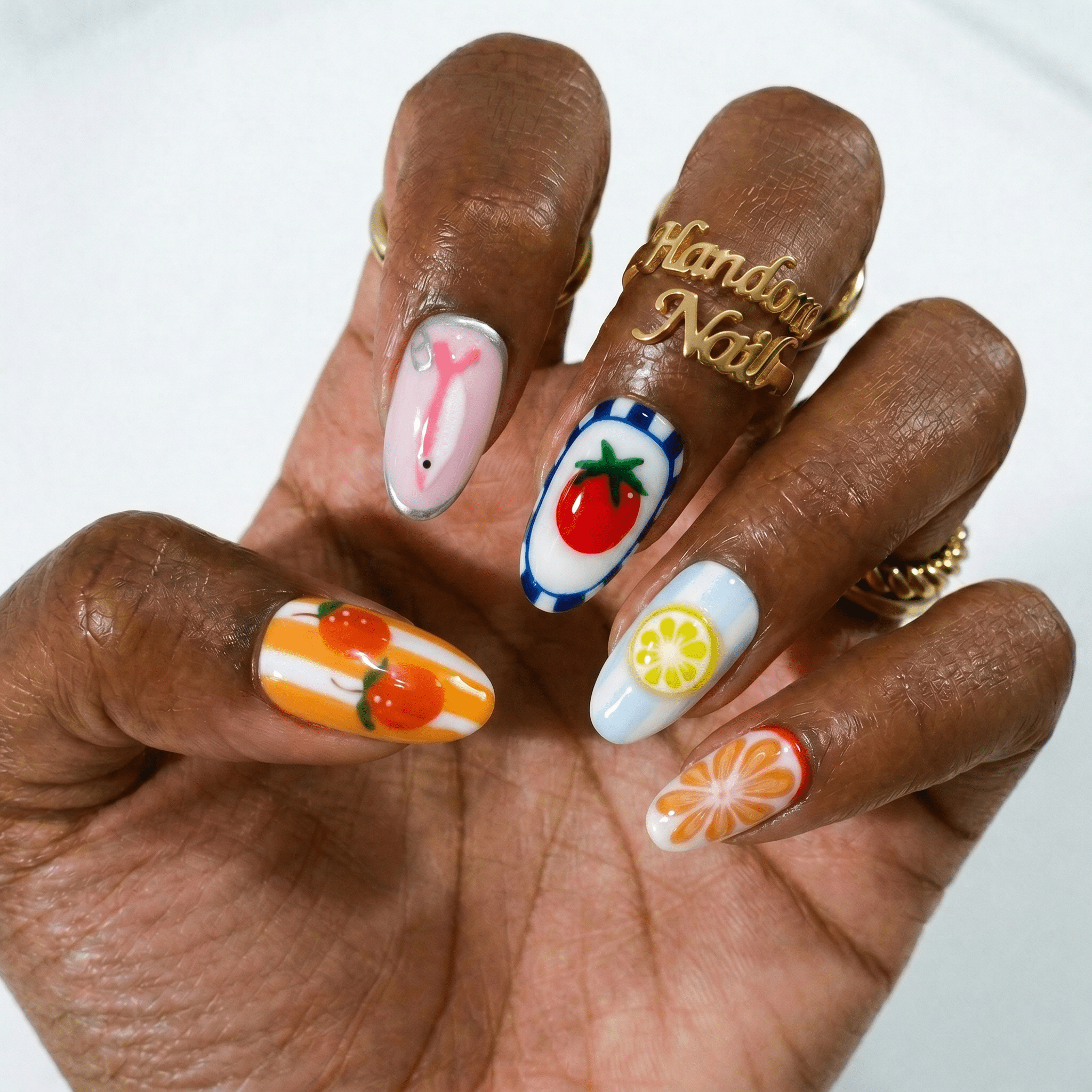 Summer Seafood press-on nails – hand-painted reusable gel set by Handora