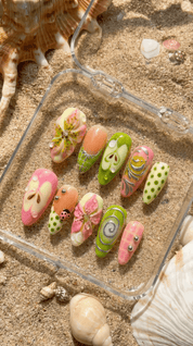 Summer Sparkle press-on nails worn on hand – almond shape by Handora