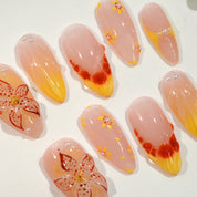 Sunkissed Bloom press-on nails – hand-painted reusable gel set by Handora