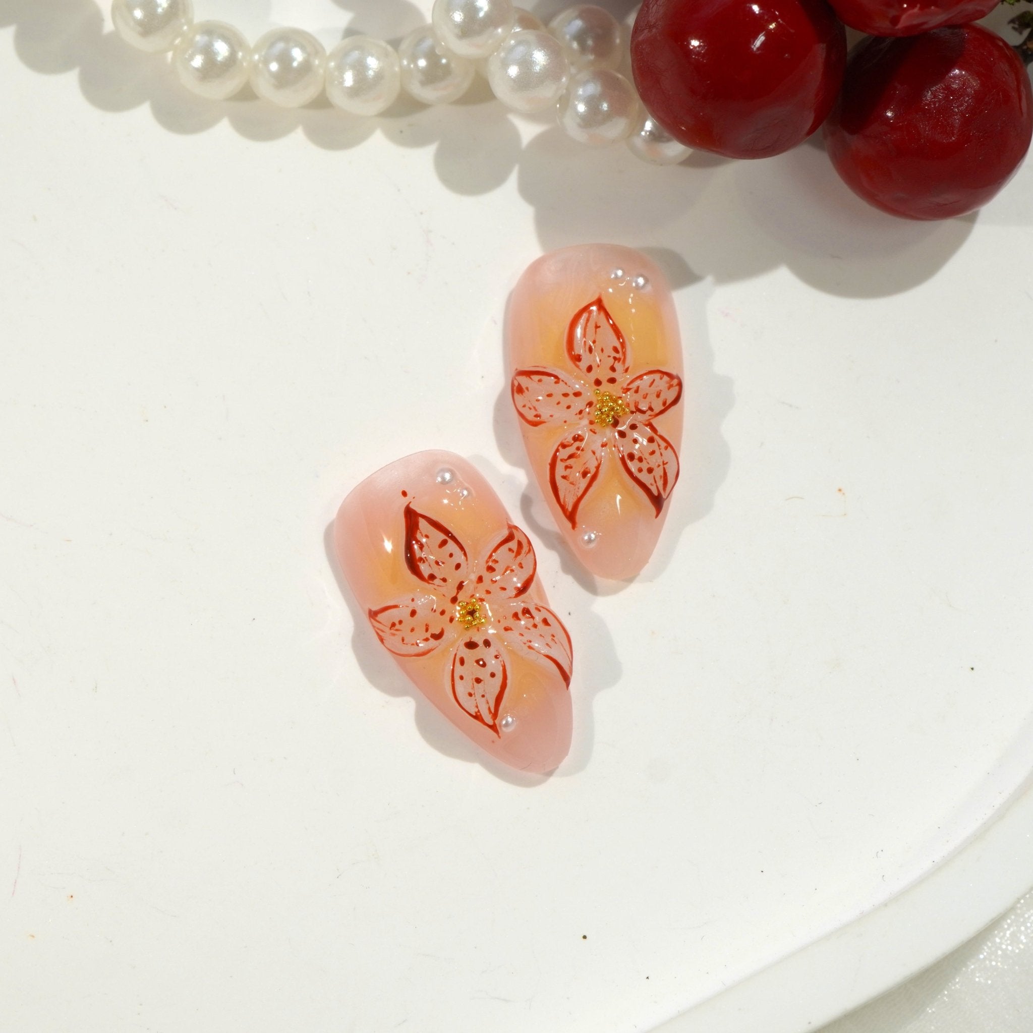 Sunkissed Bloom press-on nails – design close-up by Handora