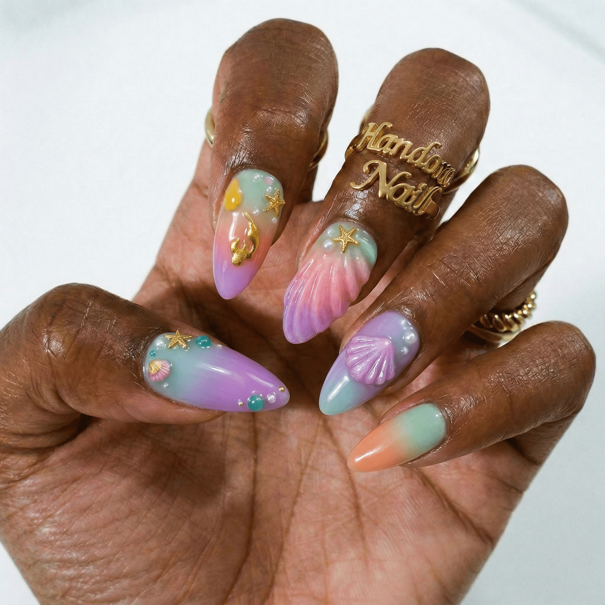 Sunset Mermaid press-on nails – hand-painted reusable gel set by Handora