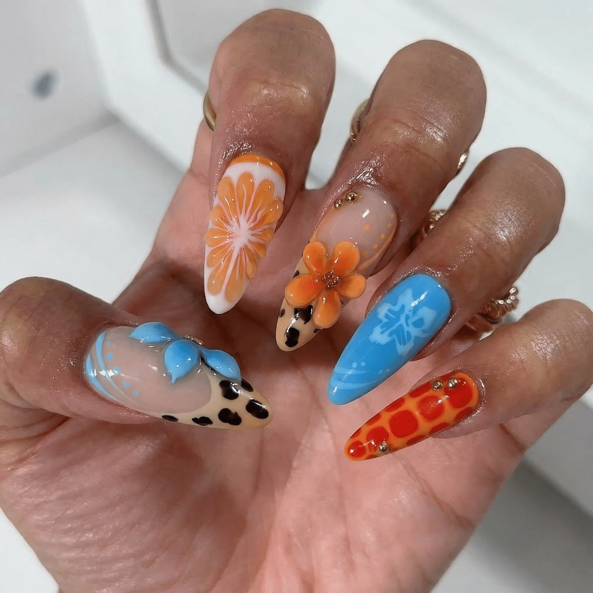 Sunset Safari press-on nails – hand-painted reusable gel set by Handora