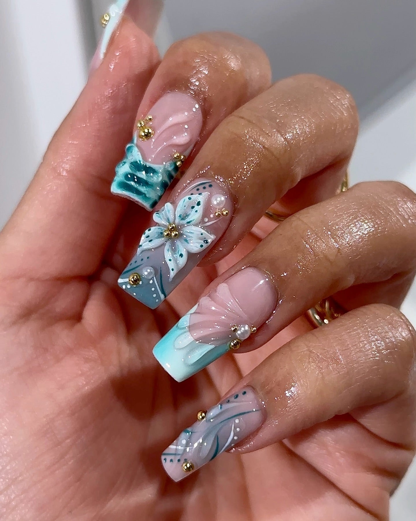 Teal Bloom press-on nails – design close-up by Handora