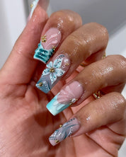 Teal Bloom press-on nails – design close-up by Handora