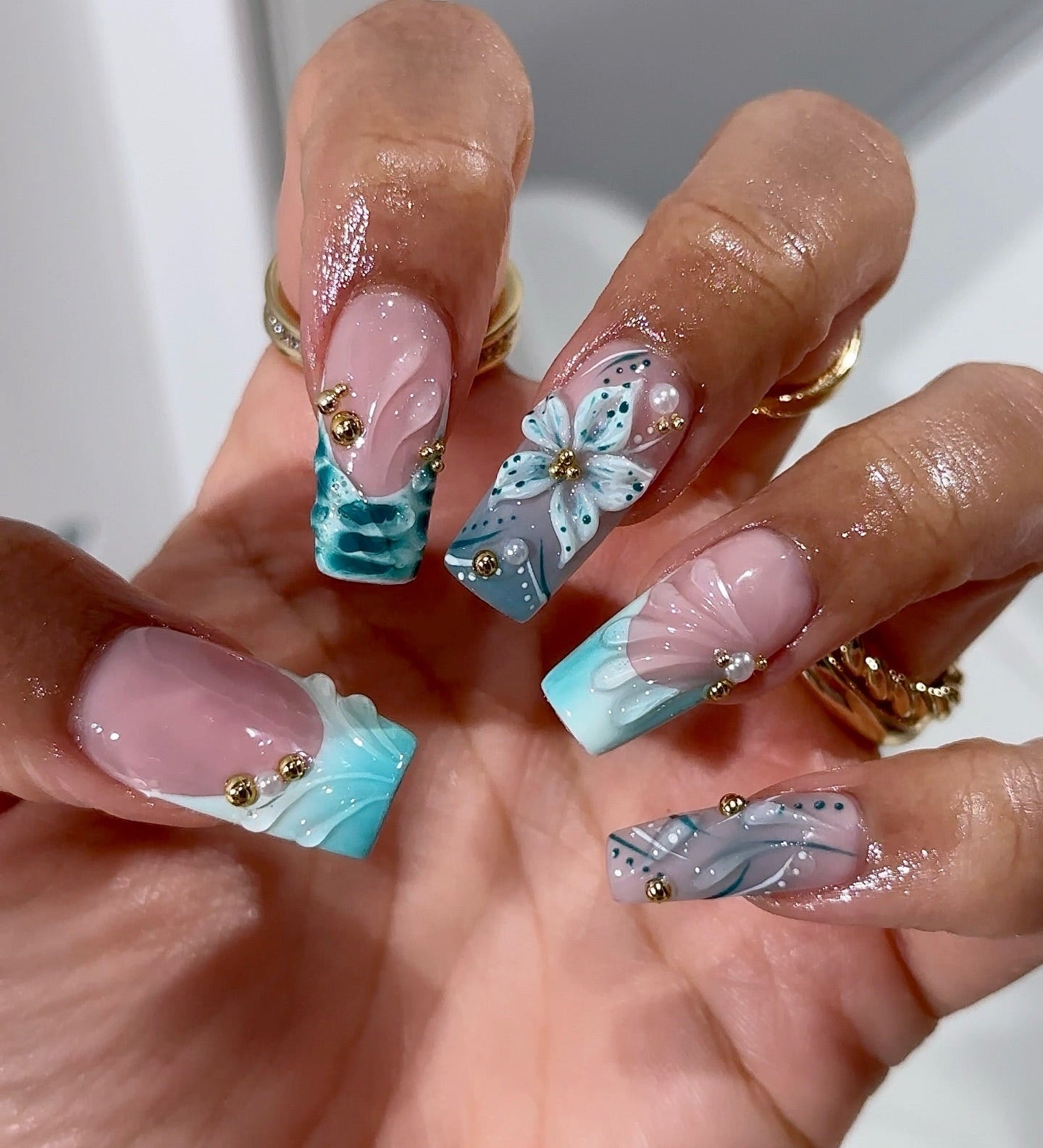 Teal Bloom press-on nails – hand-painted reusable gel set by Handora