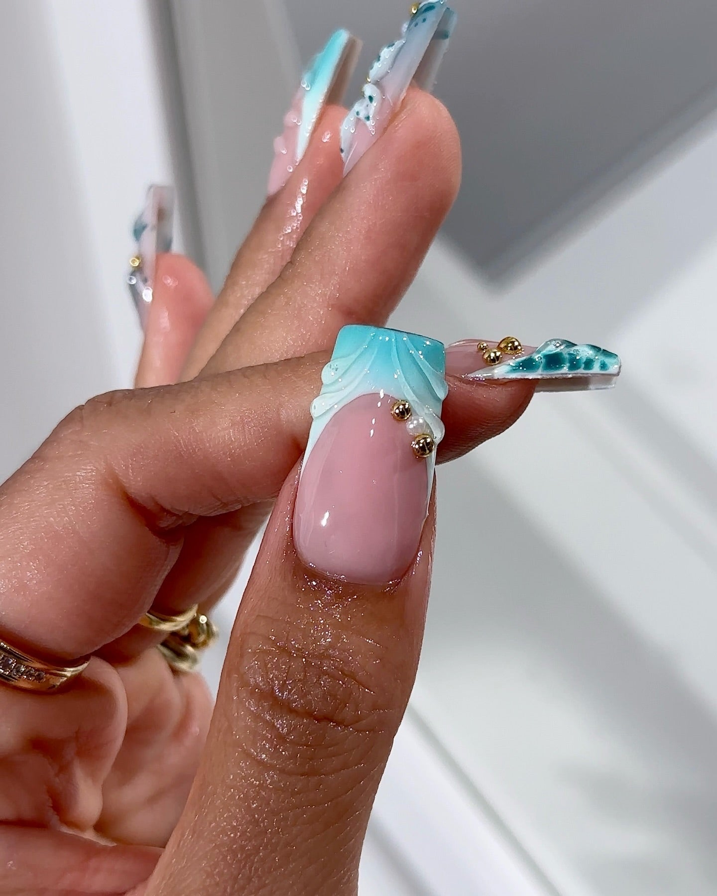 Teal Bloom floral nail design – handmade press-on nails by Handora