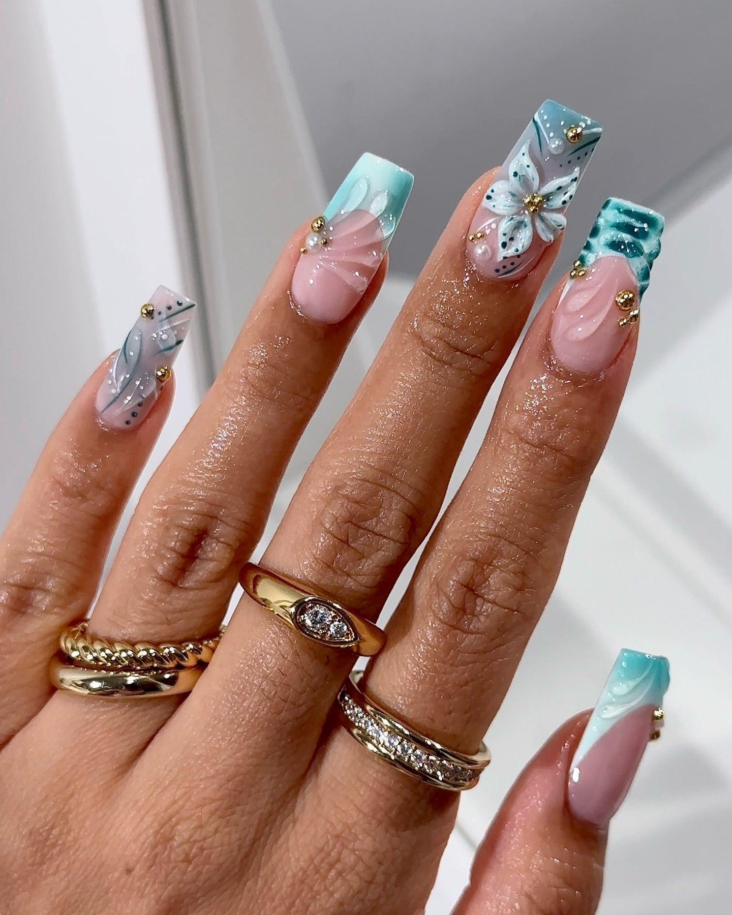 Teal Bloom salon-quality handmade press-on nails by Handora