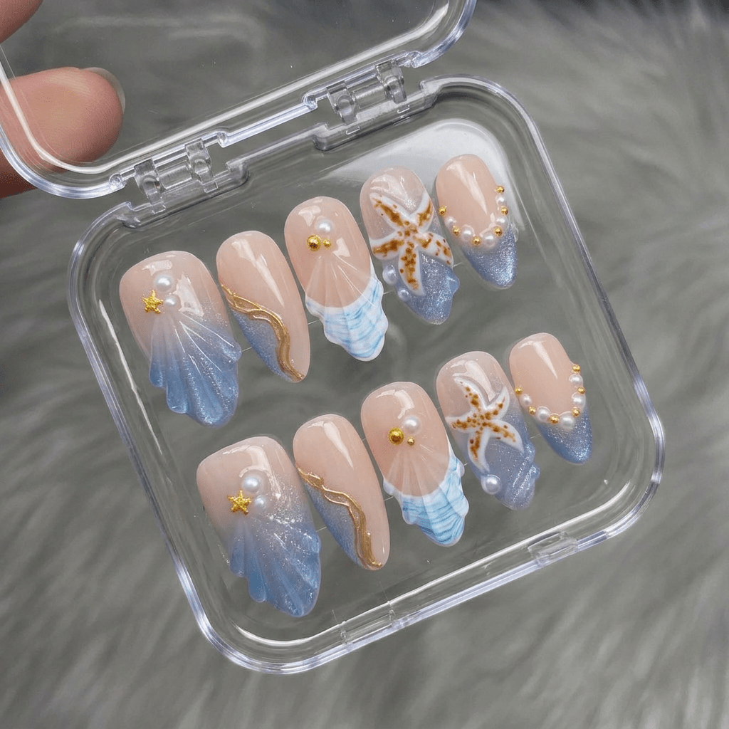 Thalassic Echo press-on nails worn on hand – almond shape by Handora