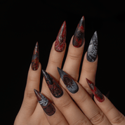 The Masque of the Red Death press-on nails worn on hand – almond shape by Handora
