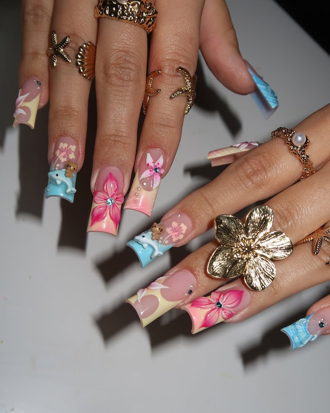 Ocean Hibiscus floral nail design – handmade press-on nails by Handora