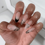 Tiger Chrome almond press-on nails – design close-up by Handora