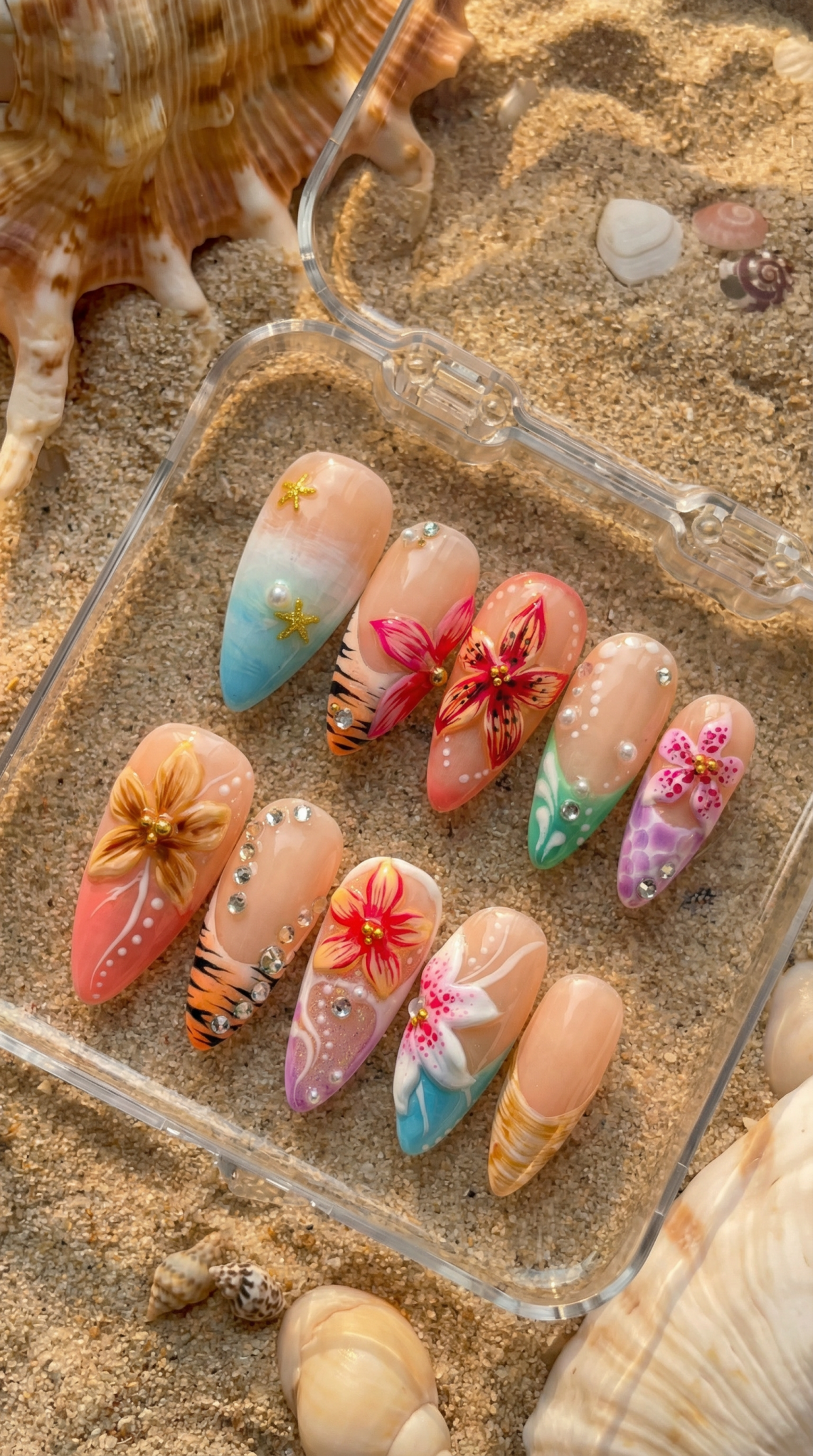 Tropical Bloom press-on nails worn on hand – almond shape by Handora