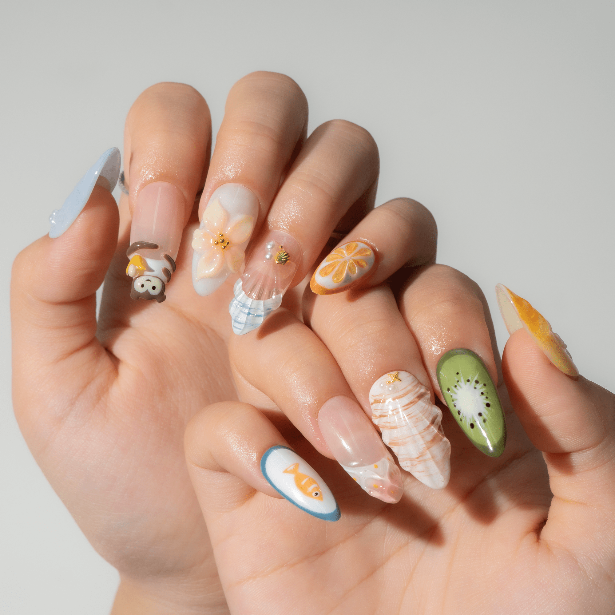 Tropical Monkey press-on nails – hand-painted reusable gel set by Handora